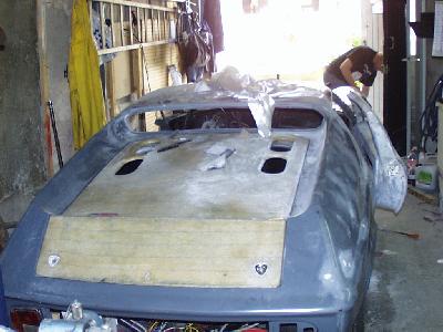 re-covered engine cover with pip pins